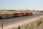 BNSF 6153 and 9047 on the point of a train